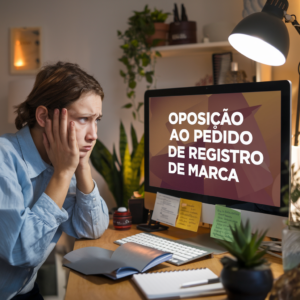 imagem de uma pessoa preocupada frente a uma tela de computador, na tela esta escrito "oposição ao pedido registro de marca".